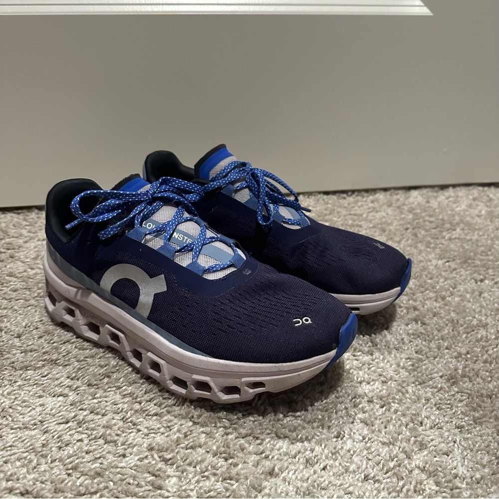 Women’s on cloudmonster size 8.5 acai and lavender color